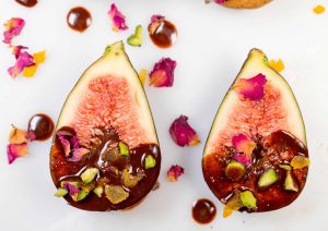 Cacao and pistachio dipped figs with almond butter