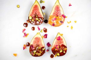 Cacao and pistachio dipped figs with almond butter