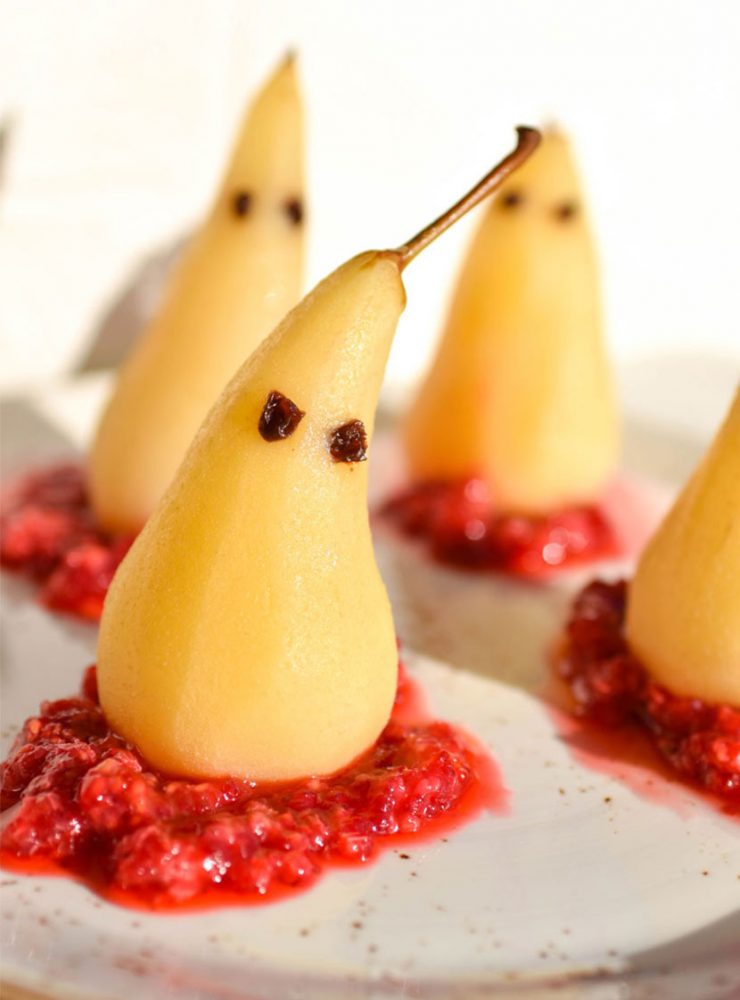 Spooky poached pears with a raspberry base