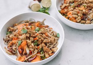 Gluten-free and vegan Sesame Tempeh Summer Noodles with carrot ribbons