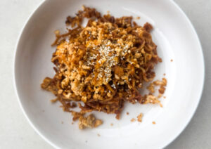 Peanut chilli oil noodles smoked tofu crumb